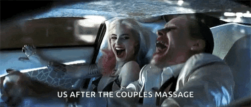 a man and a woman are laughing in a car with the words `` us after the couples massage '' written above them .