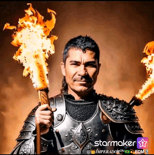a man in armor is holding two flaming torches with starmaker written on the bottom right