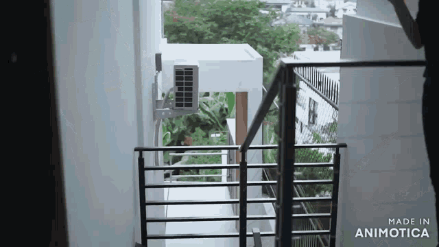 stairs leading up to a balcony with the words made in animotica on the bottom