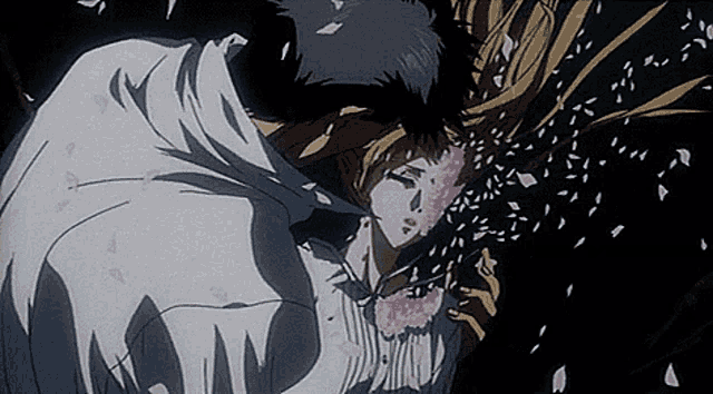 a woman with a flower in her hair is being kissed by a man in a white cape