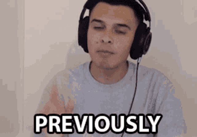 a man wearing headphones says previously in a video