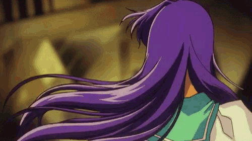 a girl with long purple hair and a green shirt