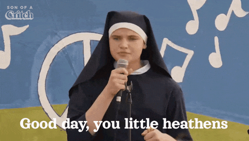 a nun singing into a microphone with the words " good day you little heathens " behind her