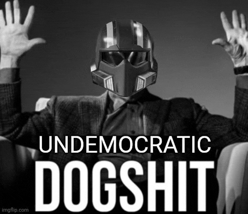 a man wearing a helmet with the words " undemocratic dogshit " written on it