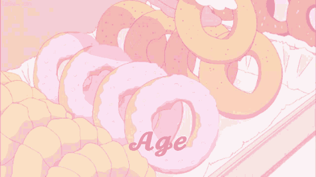 a bunch of pink donuts with the word age on it