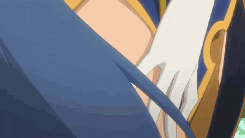 a person wearing a white glove is holding a blue object