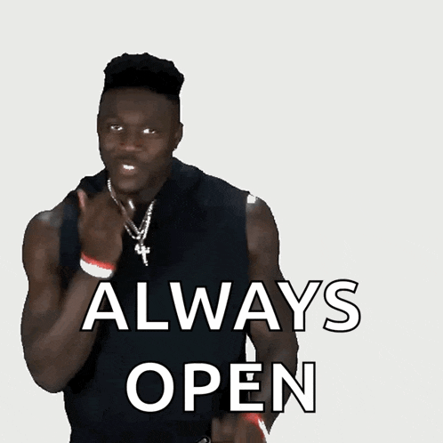 a man in a black tank top with the words always open written on it