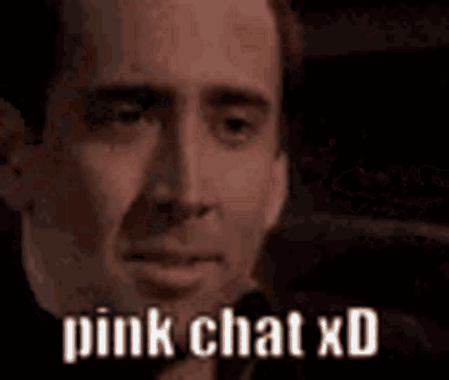a close up of a man 's face with the words `` pink chat xd '' on it .