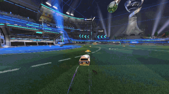 a rocket league game is being played on a soccer field