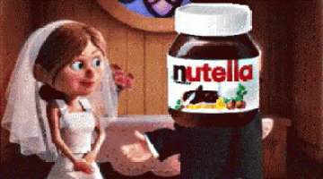 a bride and groom with a jar of nutella in the background