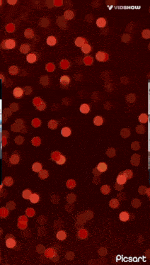 a man and a woman are standing next to each other in front of a red background that says picsart