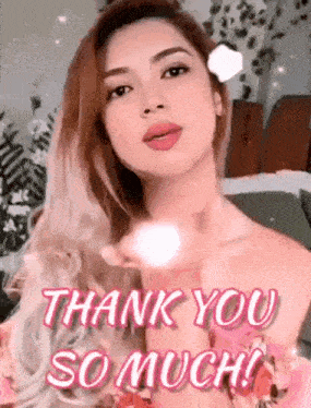 a woman is blowing a kiss with the words `` thank you so much '' .