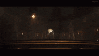 a statue of a man standing in a circle in a room