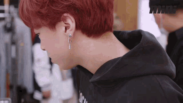 a close up of a person 's neck with the word mini visible