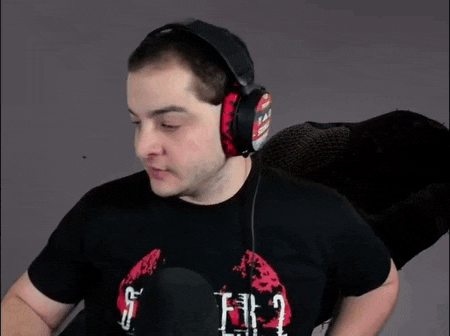 a man wearing headphones and a t-shirt that says " silent hill 2 " on it