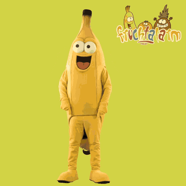 a mascot in a banana costume is standing in front of a sign that says fruitaland