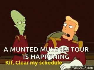 a cartoon character is talking to another cartoon character while sitting at a table .