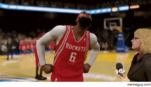 a rockets basketball player is being interviewed by a reporter