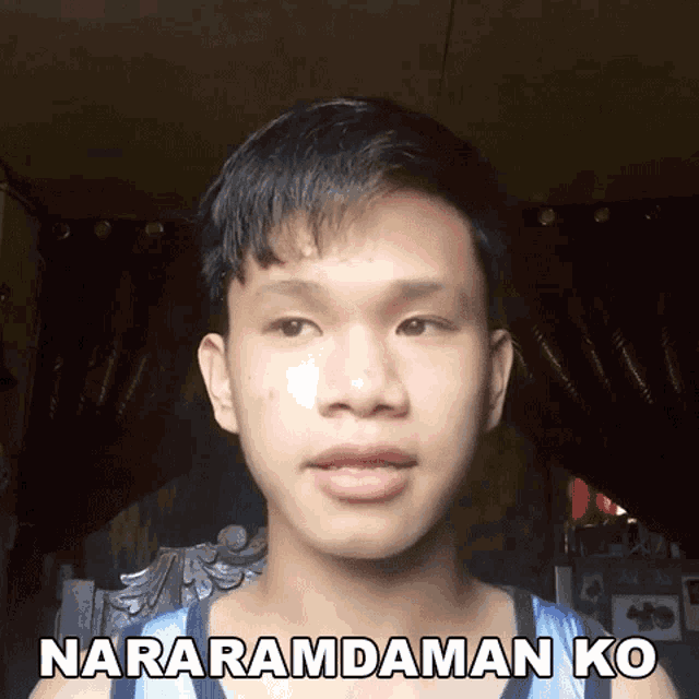 a young man with the words nararamdaman ko written on his chest