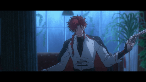 a man with red hair is holding a gun in his hand