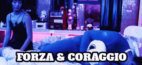 a woman sits on a bed with the words forza & coraggio on the bottom right