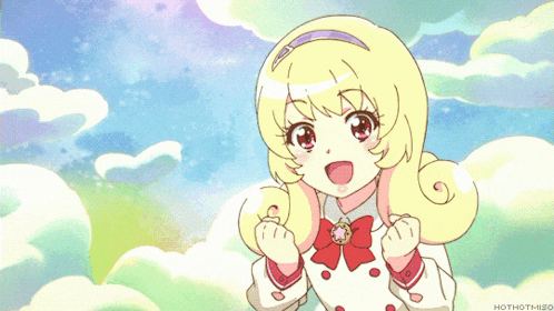 a girl with blonde hair is standing next to a pink cat