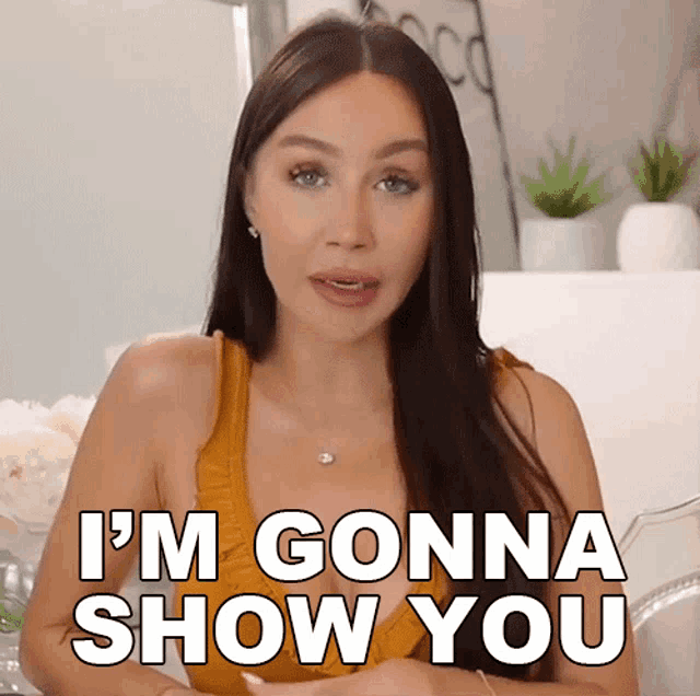 a woman says " i 'm gonna show you " while looking at the camera