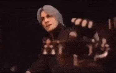 a man is talking on a telephone in a video game while sitting in a chair .