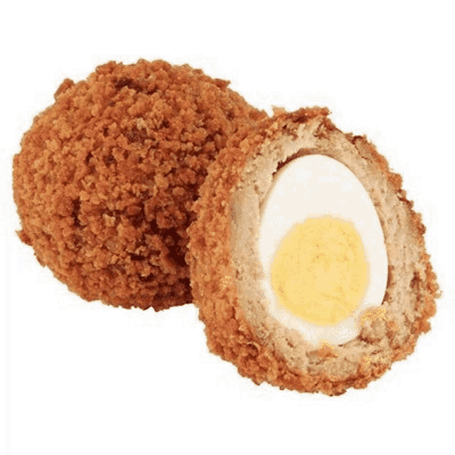 two fried scotch eggs , one of which is cut in half , on a white background .