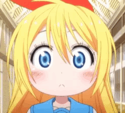 a cartoon girl with blonde hair and blue eyes is making a sad face