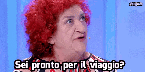 a woman with red hair says sei pronto per il viaggio ?