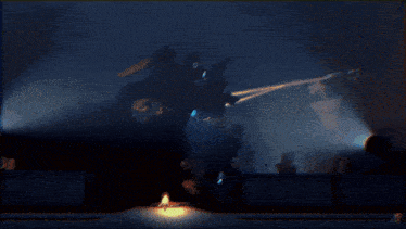 a blurry picture of a robot shooting a gun with the letter c on it