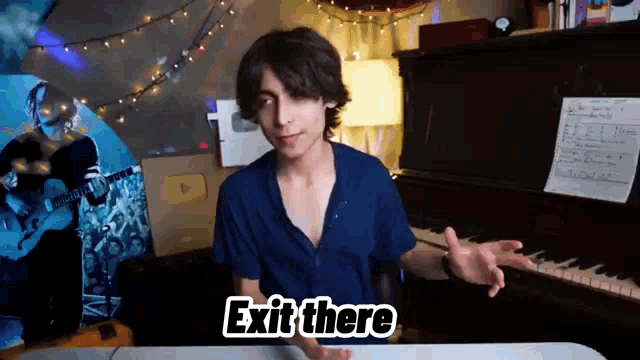 a young man sitting in front of a piano with the words exit there written on the bottom
