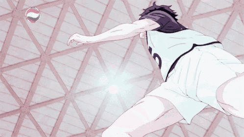 a man in a number 5 jersey is jumping in the air to catch a volleyball