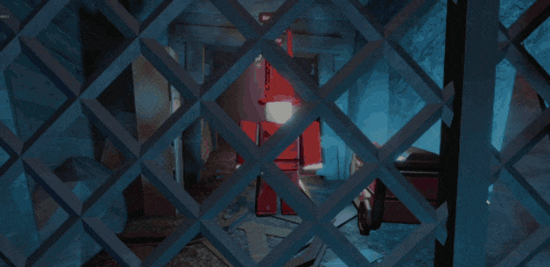 a fence with a red object behind it and a sign that says ' netflix ' on it