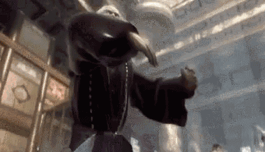 a man in a robe is dancing in a dark room .
