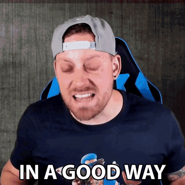 a man wearing a hat and a shirt that says in a good way on it