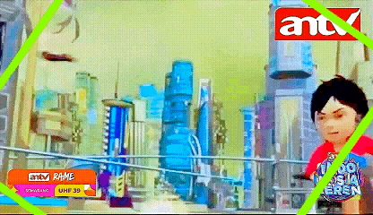 a boy in a red shirt is standing in front of a city with antv written on the corner
