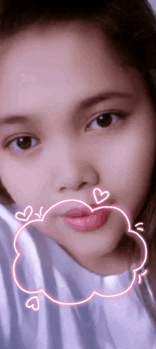 a girl with hearts drawn on her face