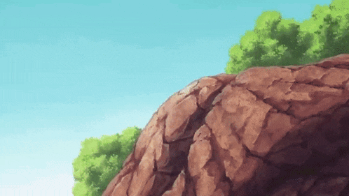 a rocky hillside with trees and a blue sky