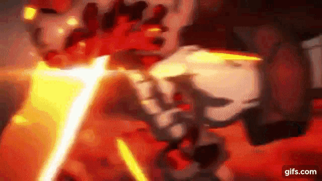 a close up of a person 's face with fire coming out of it