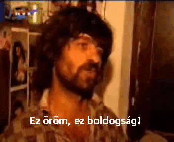 a man with a beard is saying ez öröm ez boldogság