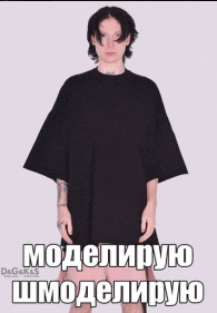 a man wearing a black t-shirt with foreign writing