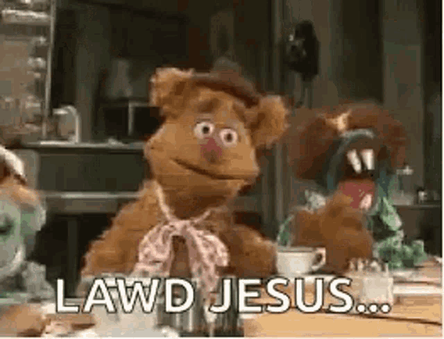 a teddy bear is sitting at a table with a cup of coffee and the words lawd jesus on it .
