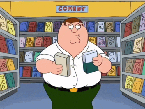peter griffin is holding a book in front of a comedy section