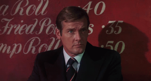 Live And Let Die James Bond GIF - Live And Let Die James Bond Looking GIFs