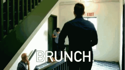 a man walking down a hallway with the word brunch written in white