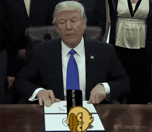 donald trump sitting at a desk with a sign that says run with it