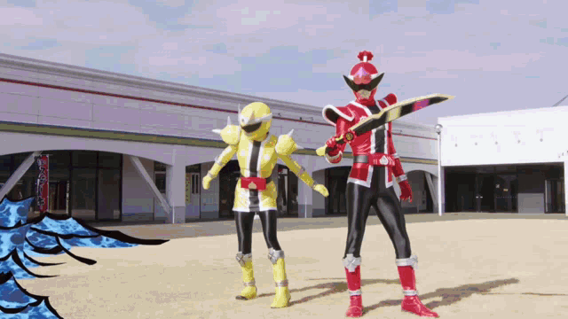 a red and yellow superhero is holding a sword in front of a building