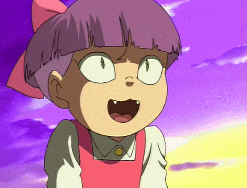 a girl with purple hair and a pink bow on her head looks surprised